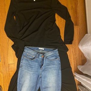 Black shirt , long in back , short in front